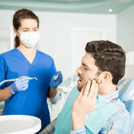Bender Dental Associates dental hygienist with a patient